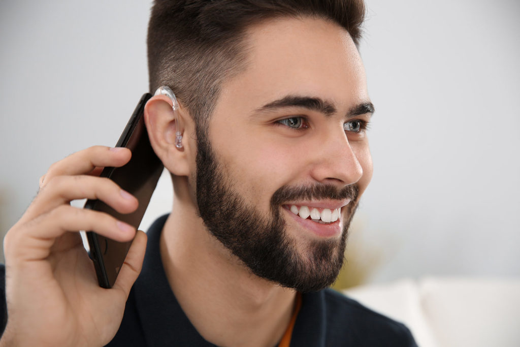 hearing aids and mobile phone regulations have made using your phone easier